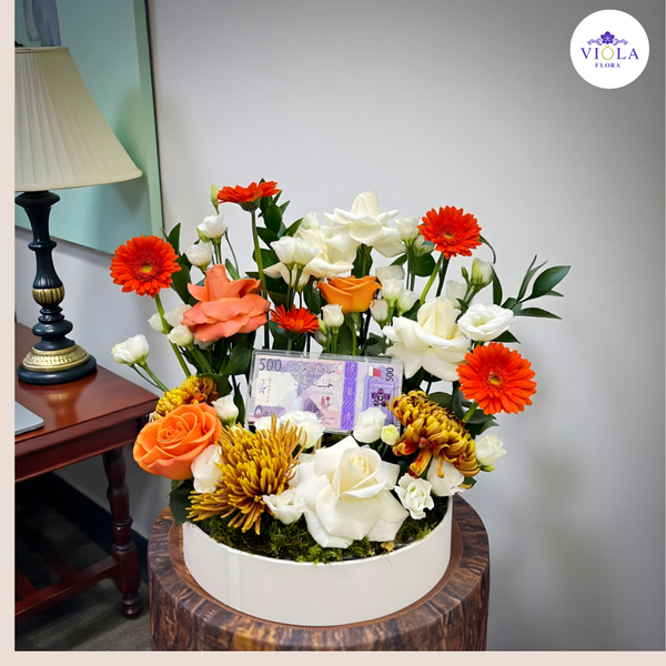 Orange Glow Money Arrangement تنسيق زهور برتقالي متوهج